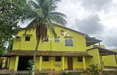 Imagem: A casa possui 3 Dormitórios, 4 Banheiros, 2 Vagas na garagem