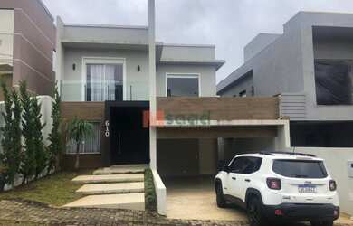 Imagem: A casa em condomínio possui 3 Dormitórios, 3 Banheiros, 4