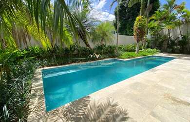 Imagem: A casa possui 5 Dormitórios, 5 Banheiros, 2 Vagas na garagem