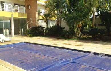 Imagem: A casa possui 3 Dormitórios, 5 Banheiros, 4 Vagas na garagem