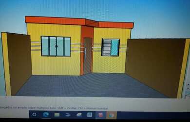 Imagem: A casa possui 2 Dormitórios, 1 Banheiro, 2 Vagas na garagem