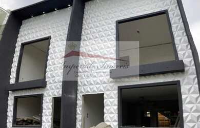 Imagem: A casa possui 2 Dormitórios, 2 Banheiros, 1 Vaga na garagem