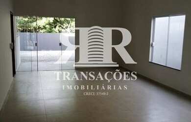 Imagem: A casa possui 3 Dormitórios, 3 Banheiros, 2 Vagas na garagem