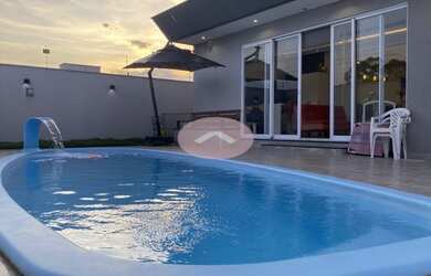 Imagem: A casa possui 4 Dormitórios, 4 Banheiros, 3 Vagas na garagem