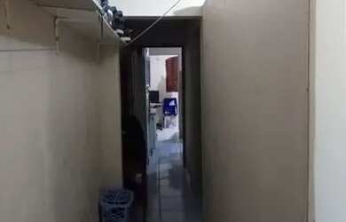 Imagem: A casa possui 3 Dormitórios, 2 Banheiros e está localizado