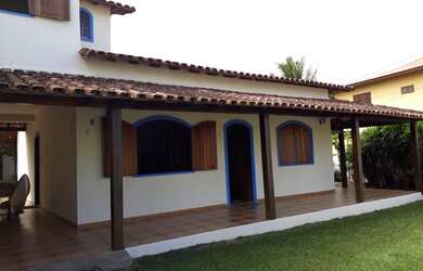 Imagem: A casa possui 3 Dormitórios, 3 Banheiros, 5 Vagas na garagem