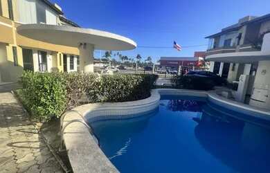 Imagem: A casa em condomínio possui 2 Dormitórios, 4 Banheiros, 2