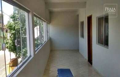 Imagem: A casa possui 5 Dormitórios, 3 Banheiros, 2 Vagas na garagem