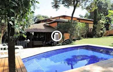 Imagem: A casa em condomínio possui 4 Dormitórios, 5 Banheiros, 5