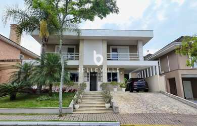 Imagem: A casa em condomínio possui 4 Dormitórios, 5 Banheiros, 4