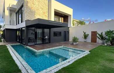 Imagem: A casa em condomínio possui 4 Dormitórios, 5 Banheiros, 2