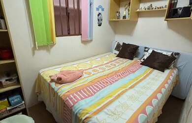 Imagem: A casa possui 3 Dormitórios, 2 Banheiros, 3 Vagas na garagem