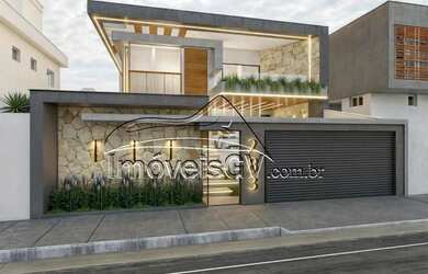 Imagem: A casa possui 3 Dormitórios, 4 Banheiros, 2 Vagas na garagem