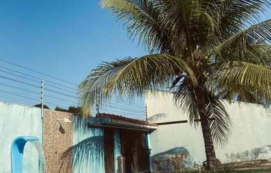 Imagem: A casa possui 5 Dormitórios, Acomodam 15 pessoas e está localizado