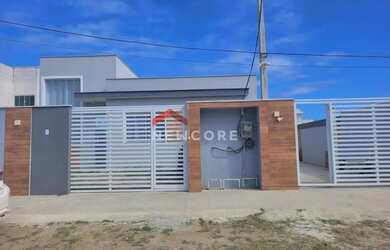 Imagem: A casa possui 3 Dormitórios, 2 Banheiros, 2 Vagas na garagem