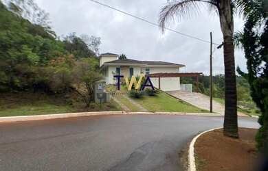 Imagem: A casa em condomínio possui 3 Dormitórios, 4 Banheiros, 5