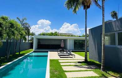 Imagem: A casa em condomínio possui 5 Dormitórios, 5 Banheiros, 5