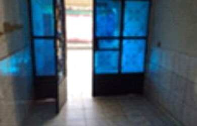 Imagem: A casa possui 2 Dormitórios e 1 Banheiro e está localizado