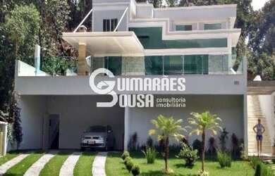 Imagem: A casa possui 4 Dormitórios, 5 Banheiros, 4 Vagas na garagem