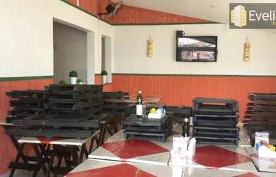 Imagem: A casa possui 2 Dormitórios, 1 Banheiro, 2 Vagas na garagem