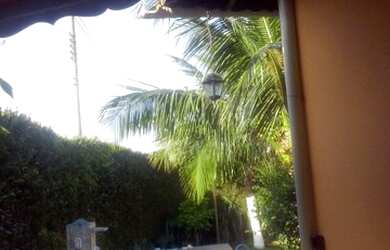 Imagem: A casa possui 3 Dormitórios, 3 Banheiros, 4 Vagas na garagem