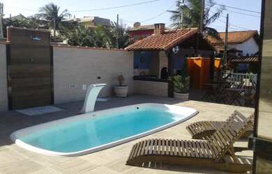 Imagem: A casa possui 5 Dormitórios, 2 Vagas na garagem e está localizado