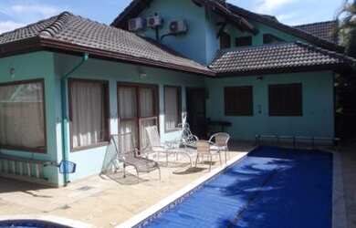 Imagem: A casa em condomínio possui 4 Dormitórios, 5 Banheiros, 4