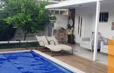 Imagem: A casa possui 3 Dormitórios, 4 Banheiros, 4 Vagas na garagem