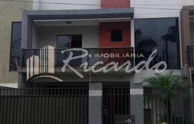 Imagem: A casa possui 3 Dormitórios, 2 Banheiros, 2 Vagas na garagem