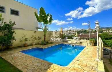 Imagem: A casa possui 4 Dormitórios, 3 Banheiros, 5 Vagas na garagem