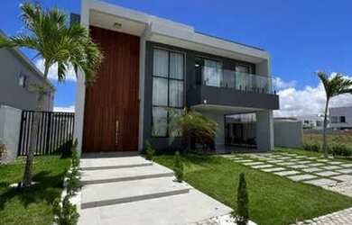 Imagem: A casa possui 4 Dormitórios, 5 Banheiros, 2 Vagas na garagem