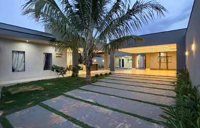 Imagem: A casa possui 4 Dormitórios, 5 Banheiros, 5 Vagas na garagem