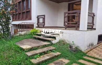 Imagem: A casa possui 5 Dormitórios, 5 Banheiros, 5 Vagas na garagem