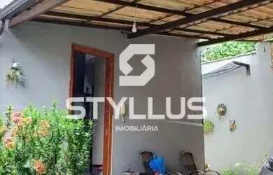 Imagem: A casa possui 3 Dormitórios, 3 Banheiros, 2 Vagas na garagem