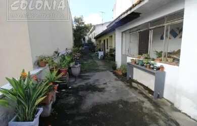 Imagem: A casa possui 4 Dormitórios, 3 Banheiros, 2 Vagas na garagem