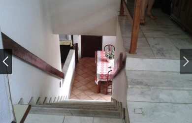 Imagem: A casa possui 3 Dormitórios, 3 Banheiros, 3 Vagas na garagem