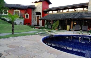 Imagem: A casa em condomínio possui 4 Dormitórios, 5 Banheiros, 5