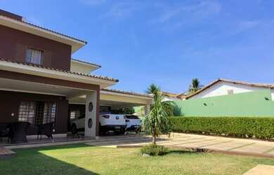 Imagem: A casa possui 3 Dormitórios, 5 Banheiros, 5 Vagas na garagem