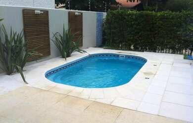 Imagem: A casa possui 5 Dormitórios, 5 Banheiros, 5 Vagas na garagem