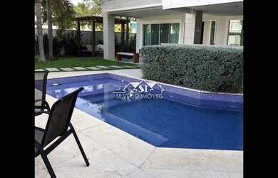 Imagem: A casa em condomínio possui 5 Dormitórios, 5 Banheiros, 2