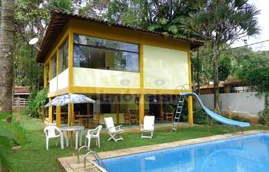 Imagem: A casa possui 2 Dormitórios, 2 Banheiros, 3 Vagas na garagem