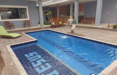 Imagem: A casa possui 5 Dormitórios, 2 Vagas na garagem e está localizado