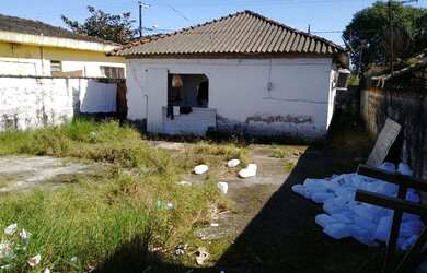 Imagem: A casa possui 2 Dormitórios, 2 Banheiros, 3 Vagas na garagem