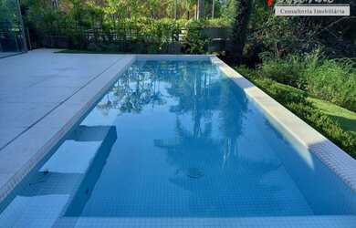 Imagem: A casa em condomínio possui 5 Dormitórios, 5 Banheiros, 5