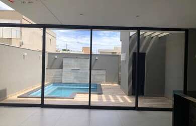 Imagem: A casa em condomínio à venda possui 4 Dormitórios, 5 Banheiros