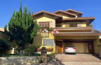 Imagem: A casa em condomínio possui 4 Dormitórios, 5 Banheiros, 4