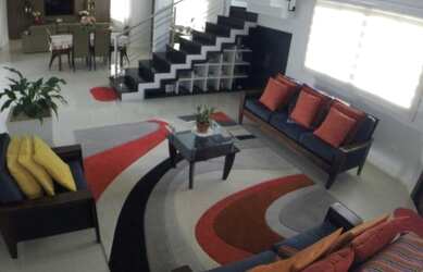 Imagem: A casa possui 3 Dormitórios, 3 Banheiros, 3 Vagas na garagem