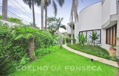 Imagem: A casa possui 3 Dormitórios, 4 Banheiros, 4 Vagas na garagem