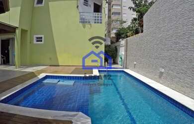 Imagem: A casa possui 4 Dormitórios, 5 Banheiros, 2 Vagas na garagem