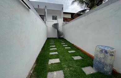 Imagem: A casa possui 3 Dormitórios, 2 Banheiros, 3 Vagas na garagem